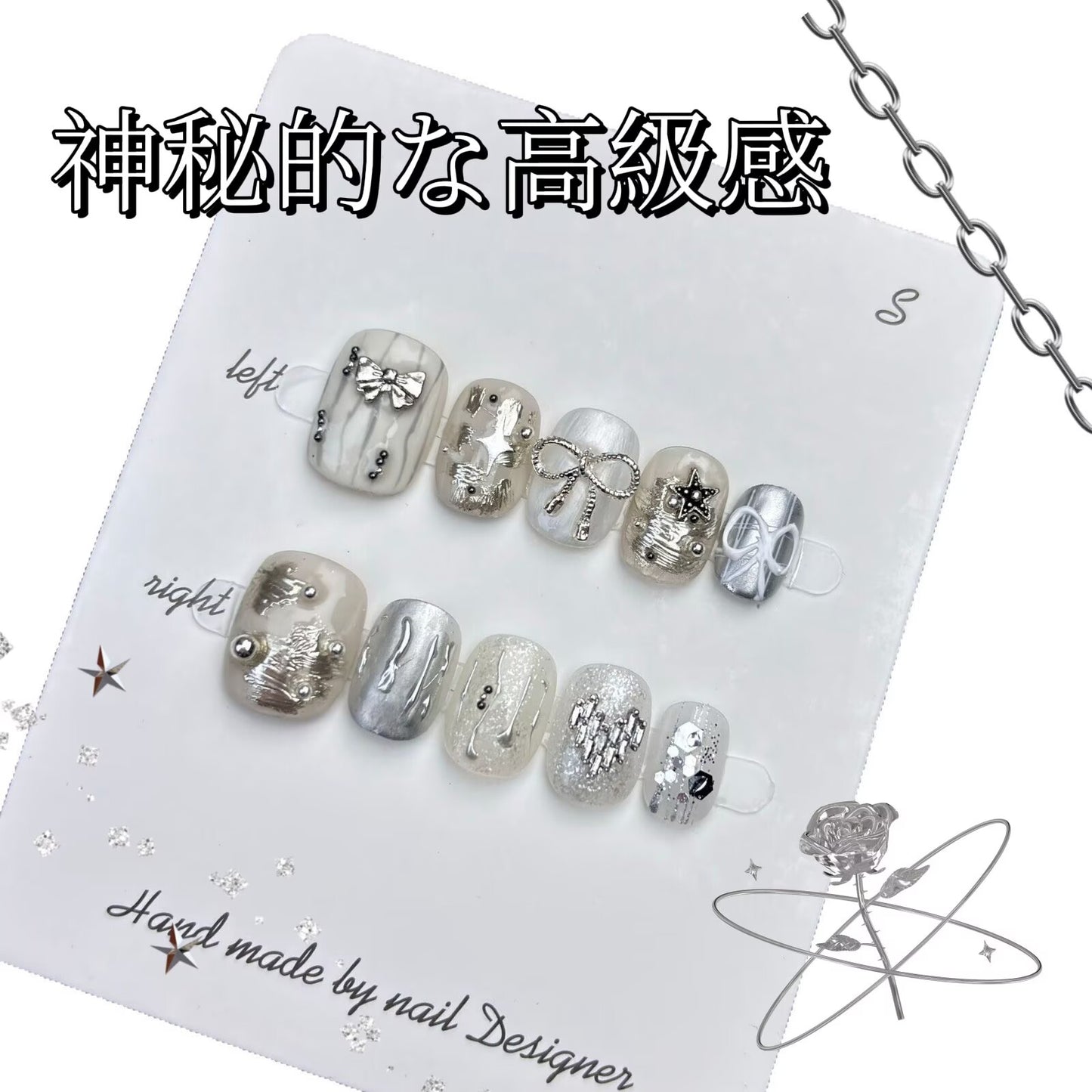 月の表面リボンパールでシルバーを飾り神秘的で高級感があります手描きで短い方円を着けてい