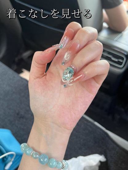 孔雀藍涙氷透頬紅純欲高級優雅な手彫りダイヤ細長款楕円を着て甲を着け