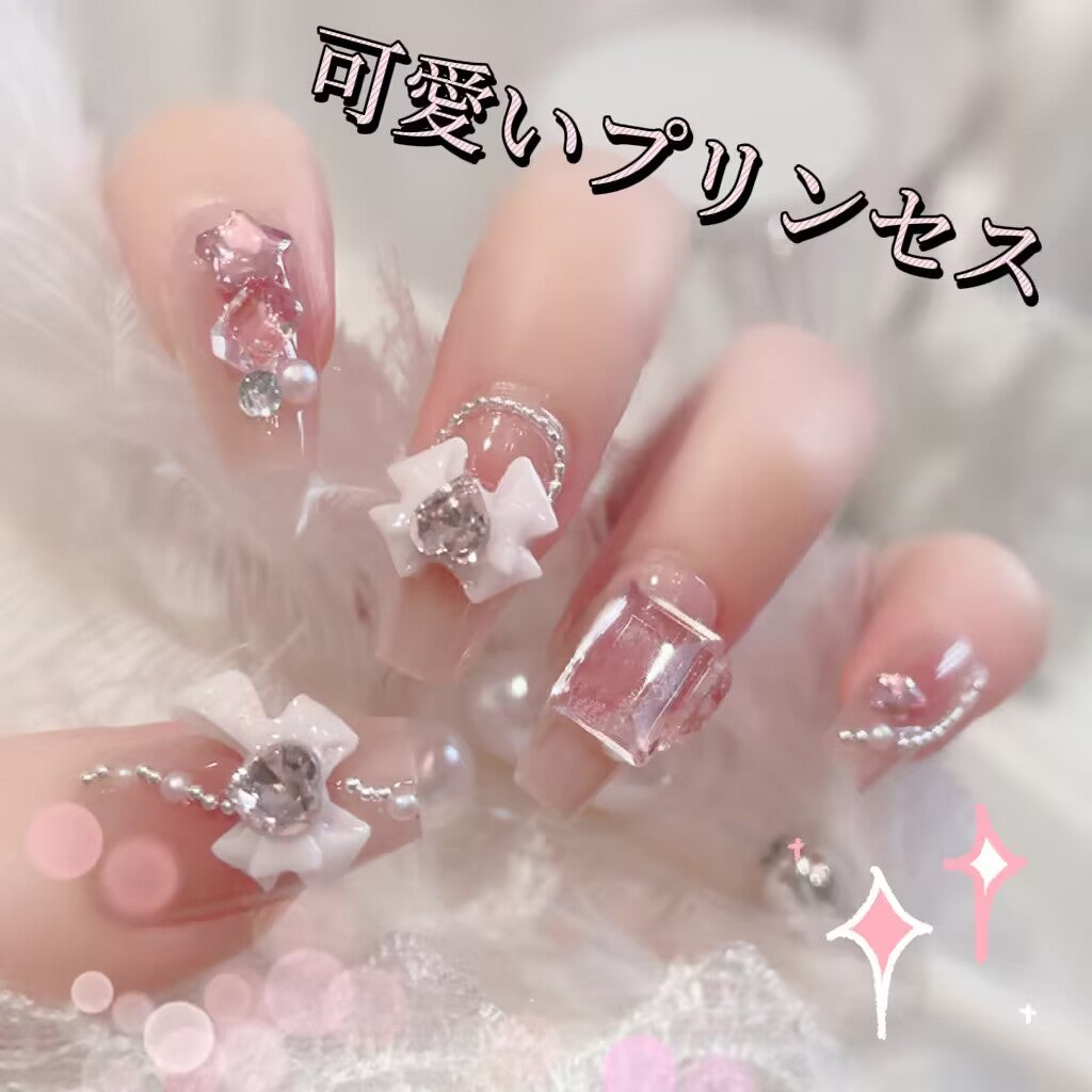 バービー姫の可愛いリボンダイヤモンド飾り重工の甘い台形のネイル