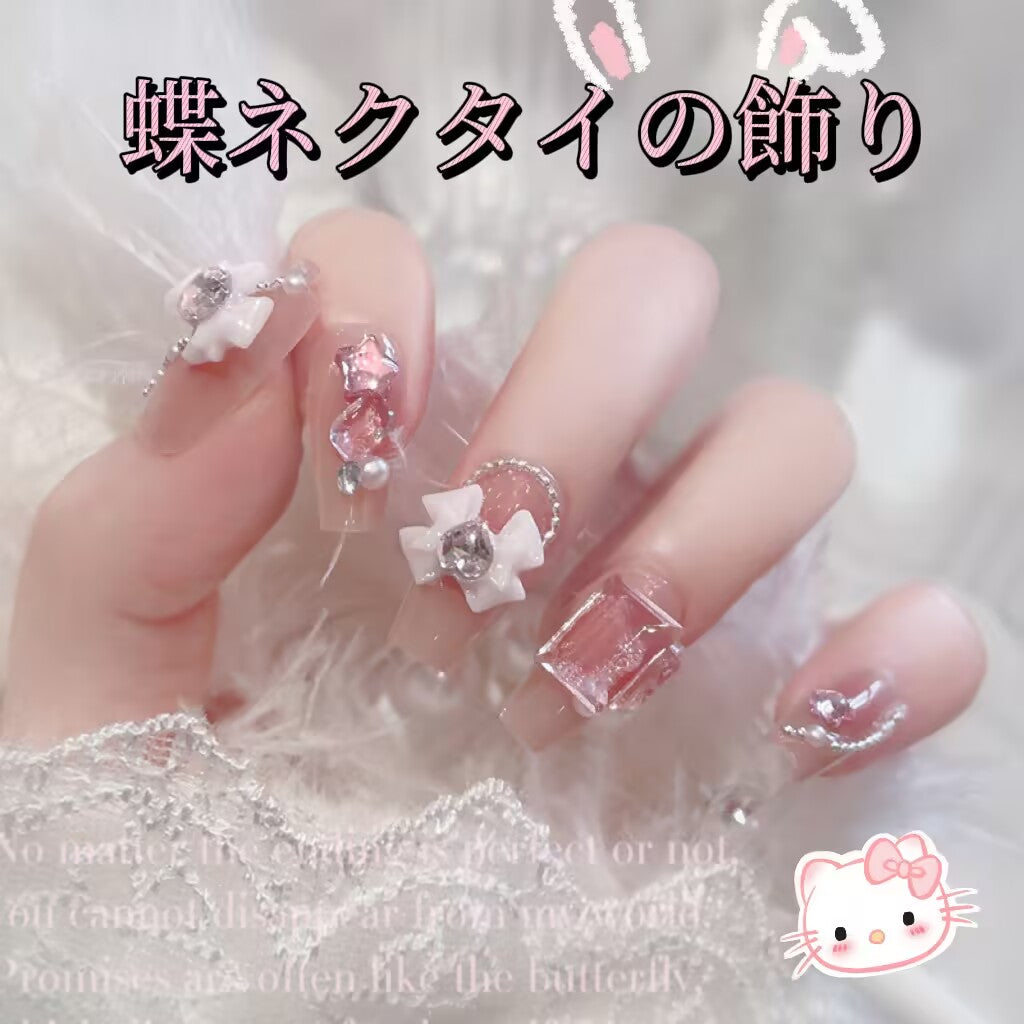 バービー姫の可愛いリボンダイヤモンド飾り重工の甘い台形のネイル
