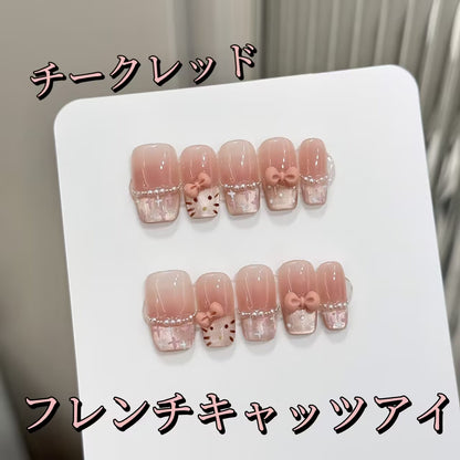 かわいい猫のチークフレンチキャッツアイキティのリボン飾りが台形になってい