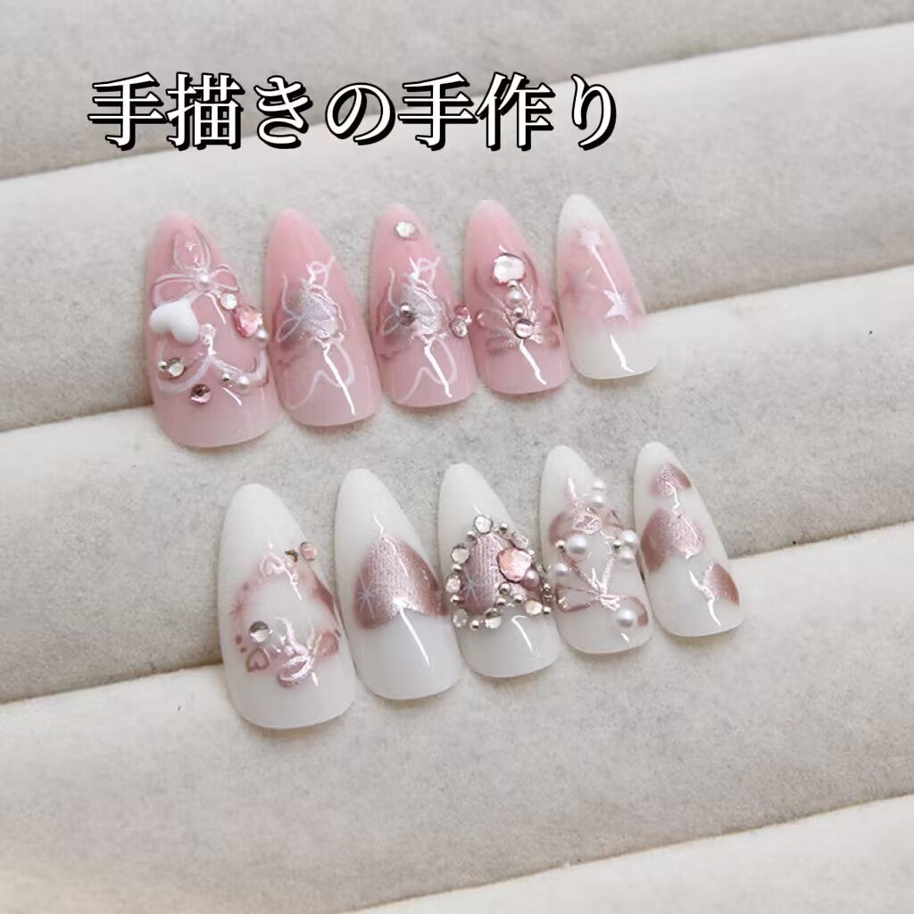 美少女手描きリボン砕いたダイヤが甘くてかわいい水滴形のネイルを飾り