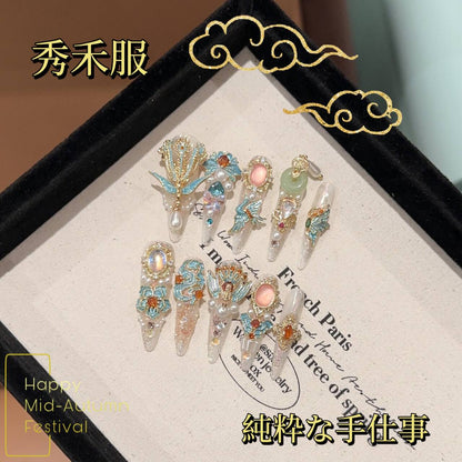 パリウム鳳冠の高級感の豪華な結婚シリーズ秀禾服重工の楕円を着用しました