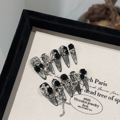 手作りで高級感黒の椿に銀色のキャッツアイが輝きます軽奢重工長楕円着衣