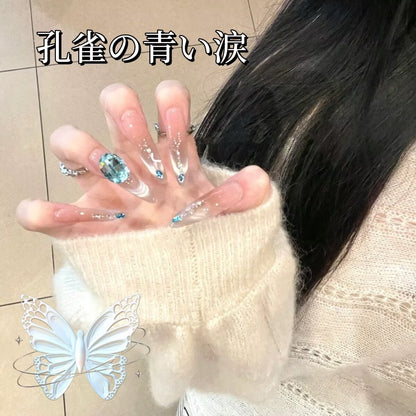 孔雀藍涙氷透頬紅純欲高級優雅な手彫りダイヤ細長款楕円を着て甲を着け