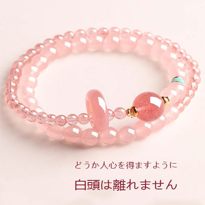 桃の花の天然イチゴの腕輪を招く女性の粉水晶の瀬取り珠精緻な双輪