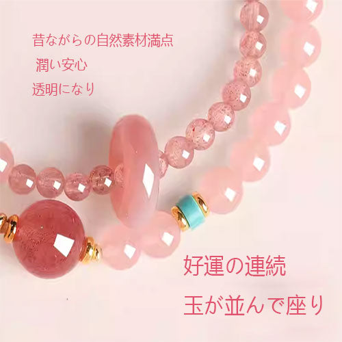 桃の花の天然イチゴの腕輪を招く女性の粉水晶の瀬取り珠精緻な双輪