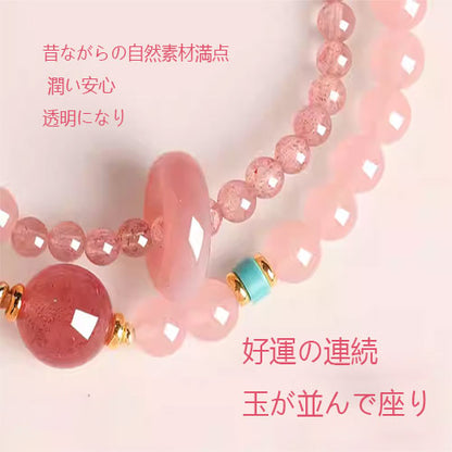 桃の花の天然イチゴの腕輪を招く女性の粉水晶の瀬取り珠精緻な双輪