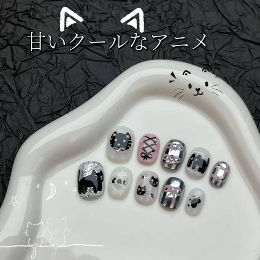 変な手を作って純手制甘い酷手描きの漫画のかわいい猫の甲を着