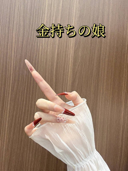 金持ちの令嬢の蝶ネクタイの猫の目の新しいモデルの秋と冬の赤い白を明らかにしますユニークなデザイン細長い甲を身に着けて