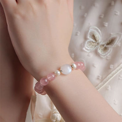 ピンククリスタルの手串高級感が巡り巡ってきますムーンストーン真珠のブレスレット