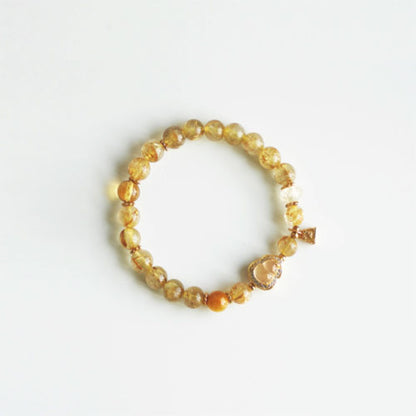 天然の金の髪の晶の腕輪の贈り物の女性の招き招き手串黄水晶