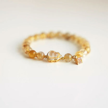 天然の金の髪の晶の腕輪の贈り物の女性の招き招き手串黄水晶