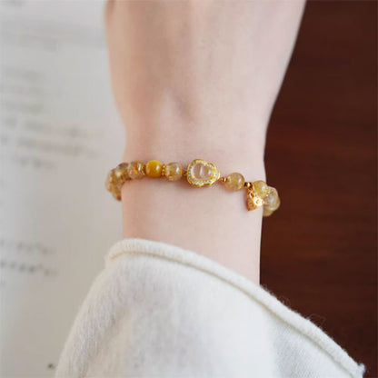 天然の金の髪の晶の腕輪の贈り物の女性の招き招き手串黄水晶