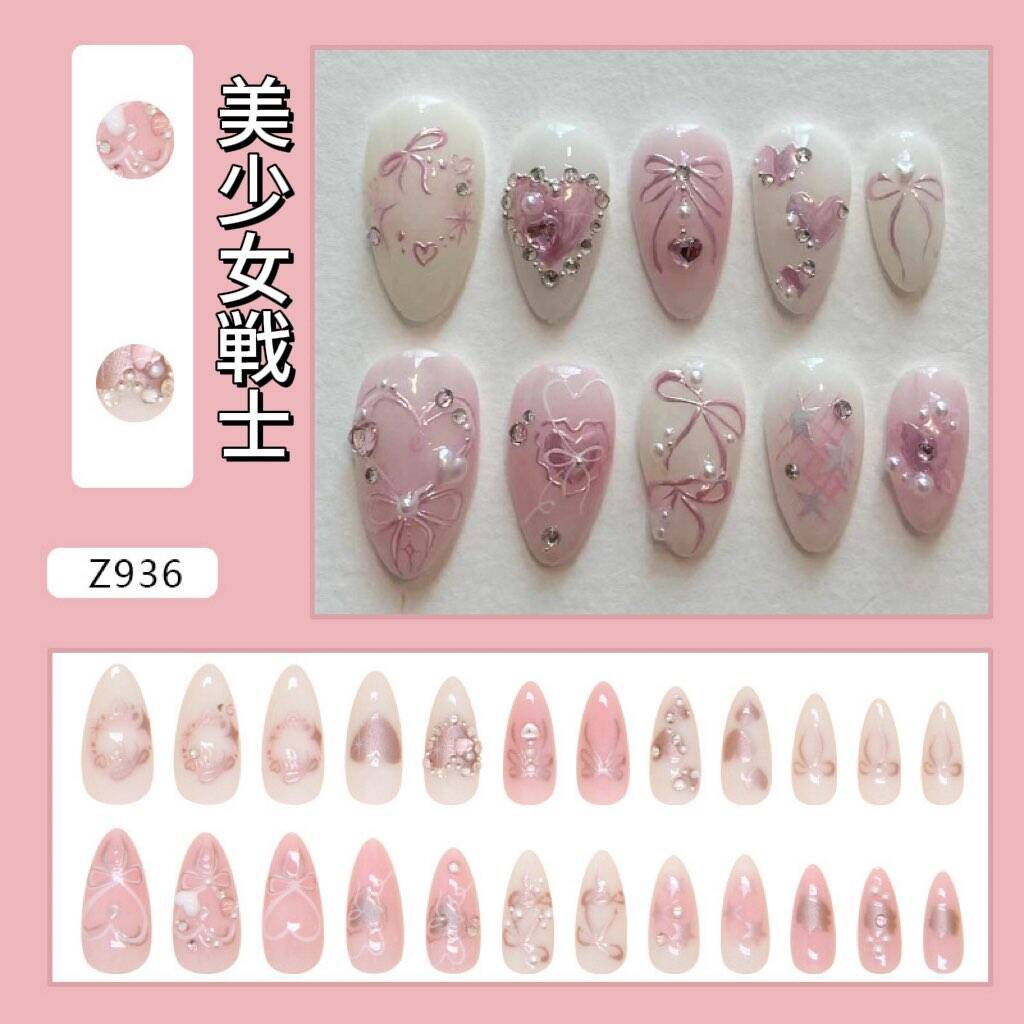 美少女手描きリボン砕いたダイヤが甘くてかわいい水滴形のネイルを飾り