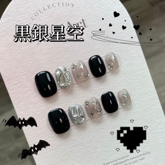 黒銀の星空の四芒星にめまいひらめきダイヤモンドを手でデザインして新しい短い台形を身に着け