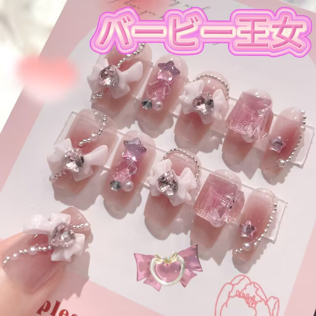 バービー姫の可愛いリボンダイヤモンド飾り重工の甘い台形のネイル