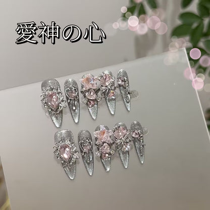 エロスの心銀色の猫の目重工粉ダイヤ長楕円純手装甲を着け